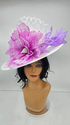 Beautiful and classy Fascinator for any occasion, weddings, photoshoot, Bridal shower, baptism and more..  For adults and kids. Just reach. - Rare find - Ready to ship  - Lightweight - Free Shipping - Fast shipping - Customize by adding different color flowers and or feathers Check my store for for styles and colors.  Hatsandpearls.etsy.com Find more at my website for more styles: www.hatsandpearls.com  Reach out to me if you can't find what you are looking for.  I can make cake custom orders and help you style and match your outfit  Tag and share your pictures when you wear and style our hats.  Instagram: @hats_pearls Facebook: Hats Pearls Thank you for visiting! Luxury Lavender Wedding Hat, White Hat For Kentucky Derby, Mother Of The Bride, Purple Hats For Royal Ascot Races, Purple Fitted Wide Brim Costume Hat, Purple Wedding Fascinator For Royal Ascot, Purple Top Hat For Kentucky Derby, Purple Hat For Royal Ascot, Purple Wide Brim Mini Hat For Royal Ascot, Adjustable Purple Costume Hats And Headpieces For Church