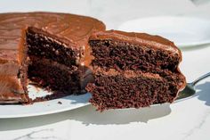 a chocolate cake with one slice cut out