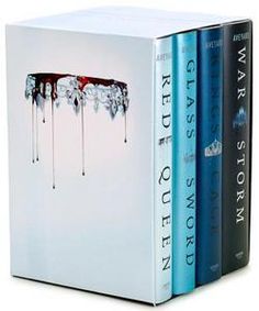 two books in the same box one has blood dripping from it and the other is blue