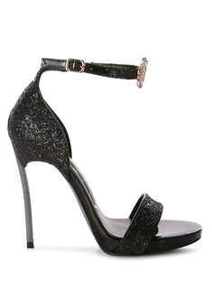 With the glam quotient so high, this pair of stiletto party sandals come with floral jewel brooch detailing for you to stand out. The sandals are all glittery, have a pin buckle fastening for a secure fit, and would look stunning at parties, weddings, and any event that needs you to glam up!Type: Stiletto HeelsUpper Material: Glitter Faux LeatherLight Cushion InsoleOuter Sole: TPRStiletto HeelOpen ToePin Buckle FasteningFloral Jewel DetailHigh-Heeled Party SandalSH3849 Style: Party Sandals Embel Jewel Brooch, Glitter Stilettos, Prom Outfit, Glitter Sandals, Buckled Heels, Slipper Socks, Flat Boots, Sneaker Heels, Material Exterior