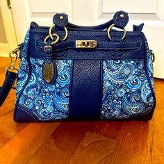 New Without Tags Simply Fabulous By Stacey Whitmore Blue Quilted Paisley Material With Navy Faux Leather Has Long Strap In Addition To Handles 2 Large Interior Pockets 3 Smaller Interior Pockets Blue Faux Leather Bags For Daily Use, Blue Faux Leather Shoulder Bag, Blue Faux Leather Bag For Daily Use, Blue Faux Leather Shoulder Bag For Everyday Use, Trendy Blue Faux Leather Bag, Blue Faux Leather Travel Bags, Blue Rectangular Faux Leather Bag, Chic Blue Bag With Snap Closure, Chic Blue Bags With Snap Closure