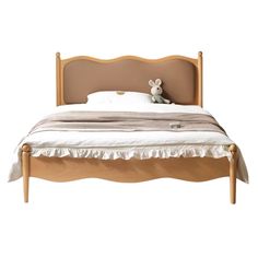 a small bed with a wooden frame and headboard on it's side, against a white background