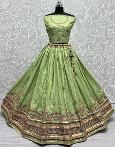 Heavy Designer Wedding Wear Bride Lehenga Choli Processing Time : 20-25 Business Days Work : Fancy Sequance,Jari Embroidery,Zarkan Diamond Work Fabric:Top : Dolla Silk Bottom : Dolla Silk Dupatta : Gajji Silk Color:Top : Pista Bottom : Pista Dupatta : Green Note : For A Fancy Designer Look,Grab These Lehenga Choli With Dupatta in Fine Colored.These Lehenga And Choli Dolla Silk And Dupatta Are Fabricated On Gajji Silk.Its Beautified With Designer Sequance,Jari Embroidery,Zarkan Diamond Work. Bride Lehenga, Silk Lehenga Choli, Silk Bottoms, Silk Lehenga, Silk Dupatta, Designer Wedding, Day Work, Wedding Wear, Lehenga Choli