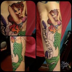 a woman with a mermaid tattoo on her arm