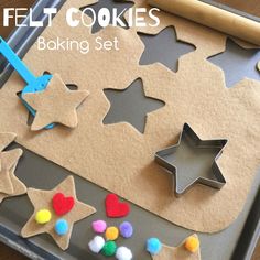 a cookie tray with felt cookies on it and the words, felt cookies baking set