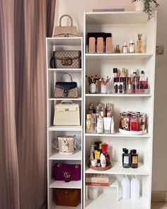 a white shelf filled with lots of beauty products