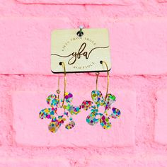 These pretty earrings are sure to catch attention and add a touch of whimsy to any outfit. Whether you choose gold or silver hoops, the Daisy Hoop Earrings are a delightful addition to your jewelry collection! 🌼💫 Cute Small Gold Hoop Earrings, Whimsical Hypoallergenic Party Earrings, Spring Dangle Hoop Earrings For Pierced Ears, Trendy Metal Flower Drop Earrings, Fun Nickel-free Drop Earrings, Trendy Dangle Hoop Earrings For Spring, Trendy Spring Dangle Hoop Earrings, Playful Jewelry With Matching Earrings For Party, Playful Gold Earrings For Party