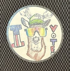 a sticker with an image of a deer wearing sunglasses and a hat on it