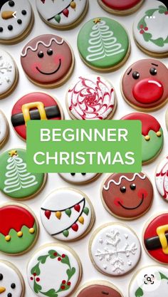 decorated christmas cookies with the words beginer christmas on them in green and white letters