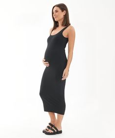 Expand your core collection with the smooth and stretchy Luxe Knit Contour Dress. Cut from our new uber luxe knit fabric, this lightweight dress allows for breathability and comfort from AM to PM.Layer this figure-hugging style under an open shirt, or on its own to show off your bump! Fitted Soft Polyester stretch jersey Scoop neckline Fully lined Sleeveless Non nursing 91% Polyester, 9% Elastane Length: 120cm (size small) Our model is 173cm tall, has an 86cm bust, a 74cm under bust and 89cm hip Contour Dress, Maternity Boutique, Am To Pm, Open Shirt, Breastfeeding Clothes, Second Pregnancy, Lightweight Dress, Nursing Bra, Lace Back