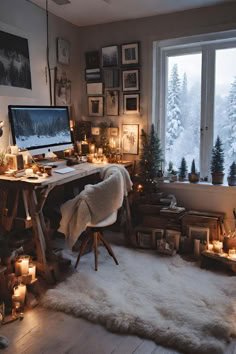 a home office decorated for christmas with candles and pictures on the wall