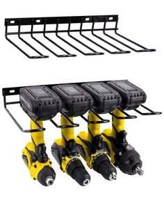 four yellow and black drillers are attached to the rack with two screwdrivers