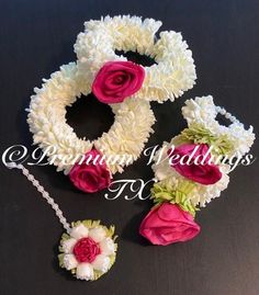 three pieces of white, pink and green hair accessories