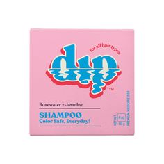 a soap bar with the word dip on it in blue and pink colors, sitting on a white surface