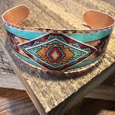 Upgrade your jewelry collection with this stunning Handmade Boho Copper Wide Cuff Bracelet! The intricate Diamond Cut Southwest Native Design adds a unique touch to any outfit. - Handcrafted with care - Comes beautifully packaged in a gift box - Perfect for any occasion - One size fits all, slightly bendable - 1" wide cuff Complete your look with the matching Drop Earrings, available in a separate listing. Give the gift of handmade beauty with this exquisite bracelet that ships fast and arrives Boho Shops, Southwest Design, Wide Cuff Bracelets, Native Design, Wide Cuff, Handmade Beauty Products, Pandora Bracelet, Handmade Boho, Bracelet Collection