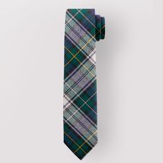 Introducing our Pure Wool Tie in Campbell Dress Modern Tartan. This best-selling tartan tie is a must-have accessory to elevate your style game for any occasion. Made from 100% pure new wool, this tie is not only stylish but also incredibly comfortable. With over 500 tartans available, there is a tie to suit every taste and occasion. Whether you're attending a clan gathering or simply a tie lover, this tie is the perfect choice. The classic design and modern twist of the Campbell Dress Modern Ta Fitted Winter Tie, Classic Plaid Standard Tie, Classic Ties For Fall, Classic Fitted Ties For Fall, Elegant Fitted Plaid Ties, Plaid Fitted Standard Tie, Fitted Plaid Standard Tie, Fitted Plaid Ties, Clan Campbell