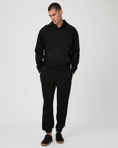 Crafted from supremely soft brushed fleece cotton, this classic black pullover hoodie will keep you warm and stylish on those casual, off-duty days. Pair Beil with the matching Mullins Sweatpant for an instant outfit. | Beil Hoodie - Black | Size XS Hooded Tracksuit With Ribbed Cuffs For Streetwear, Urban Black Sweats With Pockets, Urban Winter Tracksuit With Ribbed Cuffs, Black Athleisure Hoodie With Pockets, Black Hoodie Sweats With Pockets, Black Outerwear With Kangaroo Pocket For Loungewear, Black Athleisure Sweats With Kangaroo Pocket, Black Urban Hoodie For Loungewear, Black Long Sleeve Tracksuit With Drawstring Hood