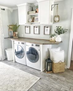 the laundry room is clean and ready to be used as a place for washers