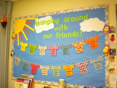 a bulletin board that says hanging around with our friends on the clothesline and books