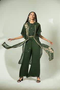 This gorgeous olive green pant set features an embroidered front open jacket, perfect for party wear or as a stylish contemporary outfit. Crafted from quality materials for a timeless look, this set will be a timeless addition to your wardrobe. Green Embroidered Pant Set For Eid, Green Fitted Designer Pant Set, Designer Green Pant Set With Zari Work, Fitted Green Pant Set With Resham Embroidery, Festive Green Pant Set With Resham Embroidery, Elegant Green Embroidered Pant Set, Green Pant Set With Resham Embroidery For Wedding, Elegant Green Sharara With Floral Embroidery, Green Resham Embroidered Pant Set For Wedding