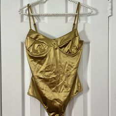 Gold Elegant Bodysuit, Elegant Gold Bodysuit, Fitted Bodysuit With Built-in Bra For Party, Fitted Party Bodysuit With Built-in Bra, Gold Fitted Bodysuit For Club, Gold Bodysuit For Night Out, Chic Gold Party Bodysuit, Party Bodysuit With Built-in Bra, Party One-piece Bodysuit With Built-in Bra