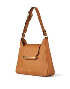 The Multrees hobo is a casual chic and functional silhouette, perfect for everyday wear. Designed with practicality and versatility in mind, this slouchy shoulder bag comes with an additional leather strap, turning into an effortlessly cool crossbody. Wear yours with your favorite seasonal separates to add instant polish to any ensemble. Fall Shoulder Bag With Gold-tone Hardware For On-the-go, Modern Hobo Shoulder Bag With Gold-tone Hardware, Modern Crossbody Hobo Bag With Gold-tone Hardware, Versatile Bags With Gold-tone Hardware For Fall, Versatile Crossbody Baguette Bag With Gold-tone Hardware, Luxury Fall Hobo Bag For Everyday, Modern Baguette Bag With Gold-tone Hardware For Everyday, Versatile Hobo Bag With Gold-tone Hardware, Versatile Hobo Bag With Gold-tone Hardware For Work