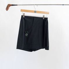 Meet The Hamptons Skort. It's like shorts with a total upgrade. We're talking about that effortlessly chic look perfect for a day out or hitting the links. The front keeps it refined, like the classiest gal at a Hamptons soirée. But turn around, and bam – you've got that playful edge that's just so you. It's like a double-take fashion moment, wrapped up in one fabulous skort. The wrap around skirt with front tie is easy to wear, and the super light athletic fabric keeps it sporty, breathable, an Athletic Fabric, Womens Golf Skirts, Golf Skirt, Wrap Around Skirt, Golf Skirts, Double Take, Ladies Golf, Wrap Around, The Hamptons