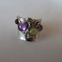 Silver Wide-band Jewelry With Gemstones, Silver Wide Band Jewelry With Gemstone, Silver Open Ring With Gemstone Accents, Multicolor Natural Stone Rings For Anniversary, Anniversary Rings With Multicolor Natural Stones, Silver Fusion Rings With Gemstone Accents, Multicolor Amethyst Ring For Gift, Multicolor Multi-stone Fusion Rings, Unique Silver Multi-stone Gemstones