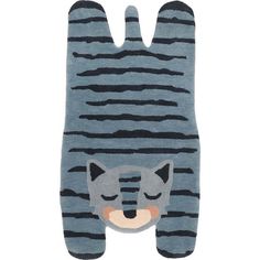 a cat shaped rug with black and grey stripes on the front, it's eyes closed