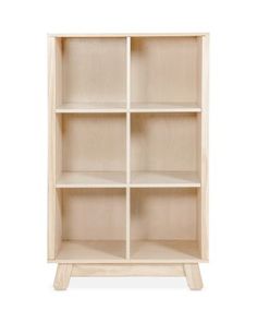 a white bookcase with four shelves on each side