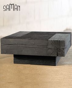 a piece of wood sitting on top of a wooden table