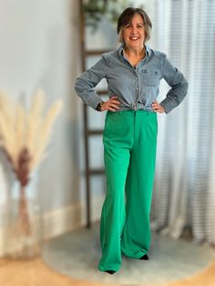 In The City, kelly green, wide leg trousers, a vibrant and chic addition to your wardrobe. These trousers bring a burst of color to your style, while the wide leg silhouette adds a touch of sophistication. Crafted with care, the rich kelly green hue offers a refreshing take on classic trousers. The versatile design effortlessly transitions from casual to formal occasions, making them a versatile piece in your wardrobe collection. Fits true to size with limited stretch. Model Info Char 5'6" Typic Chic Green Cotton Pants, Chic Green Relaxed Fit Wide Leg Pants, Trendy Green Relaxed Fit Wide Leg Pants, Green Wide Leg Pants For Fall, Chic Green Wide Leg Pants With Relaxed Fit, Trendy Green Wide Leg Pants With Relaxed Fit, Green Relaxed Fit Wide Leg Pants, Green Wide Leg Bottoms For Work, Green Wide-leg Workwear Bottoms