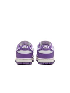 Brighten up your sneaker collection with the Nike Women's Dunk Low in White/Black Raspberry. This vibrant design features a crisp white base with bold black and raspberry accents, combining eye-catching style with the classic comfort of the Dunk Low. Nike Sporty Slip-on Sneakers With Rubber Sole, Sporty Purple Sneakers With Boost Midsole, Purple Sneakers With Rubber Sole For Streetwear, Sporty Purple High-top Sneakers For Streetwear, Purple Custom Sneakers For Light Sports, Custom Purple Sneakers For Light Sports, Sporty Purple Skate Shoes With Boost Midsole, Purple Mid-top Sporty Sneakers, Purple High-top Athleisure Sneakers