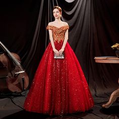 Custom size and custom color are available, there is no extra payment for custom size or custom color. Product Information: Dress Number: #3TRG, Material: Tulle, Silhouette: A-line Color: Red, Hemline: Floor Length, Back Details: Lace-up Delivery times: Processing time: 2-3 weeksShipping time: 3-5 working days Rush Order Rush order service is available. For rush order, you can receive your order in 2 weeks. Custom Measurements For custom size, please leave us the following measurements in the or Ball Gown Quinceanera Dresses, Red Ball Gown, Long Formal Dresses, Gown Gold, Red Homecoming Dresses, Sequin Prom Dress, Red Ball, Ball Gowns Evening, Pageant Gowns