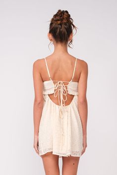 Final Sale - Get it before it's gone! The Drew Off-White Eyelet Babydoll Cami Mini Dress is here for sunshine and fun summer days! The off-white embroidered eyelet fabric forms this cute bralette babydoll dress with cami straps and a cutout bodice. The attached mini skirt falls from an empire waist. A ruffle back with ties finishes the look! Style with cute sandals for a fun summer look! DETAILS & CARE 100% Polyester. 100% Polyester Lining. Machine wash cold. Imported. Babydoll Cami, Cami Mini Dress, White Eyelet Dress, Eyelet Fabric, Mini Cami Dress, Pink Boho, Cute Sandals, Eyelet Dress, White Eyelet