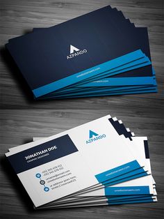 two sided business card with blue accents on the front and back, sitting on a wooden surface