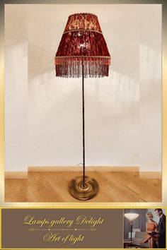 a lamp that is on top of a wooden floor