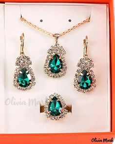 Olivia Mark - Exquisite Rhinestone Quartz Watch and Jewelry Set with Ring, Bracelet, Waterdrop Earrings, and Necklace - 5pcs Costume Jewelry Set With Sparkling Stones For Gift, Gift Costume Jewelry Sets With Sparkling Stones, Costume Jewelry With Rhinestones For Gifts, Jeweled Crystal Jewelry Sets As Gift, Jeweled Crystal Jewelry Sets For Gifts, Crystal Jewelry Sets As Gift, Crystal Drop Jewelry With Bling, Costume Jewelry Sets With Rhinestones For Gifts, Elegant Bling Jewelry Sets As Gift