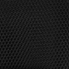 black fabric textured with small circles and lines on the side, closeup photo