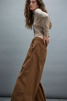 So classic and academia-inspired, these wear-everywhere chinos from our We The Free collection deserve a spot in every wardrobe. **Fit:** Mid-rise, relaxed wide-leg fit **Features:** zip fly and button closure, four-pocket design, classic structured fabrication **Why We ❤ It:** Easy with your favorite tee or unexpected with a billowy blouse, this pair has endless ways to wear. | We The Free Rylee Chino Trousers at Free People in Tan, Size: US 8 Full-length Chinos With Welt Pockets For Fall, Full Length Chinos With Welt Pockets For Fall, Fall Chinos For Workwear With Welt Pockets, Relaxed Fit Wide Leg Work Chinos, Fall Chinos For Business Casual With Button Closure, Fall Business Casual Chinos With Button Closure, Classic Relaxed Fit Wide-leg Chinos, Spring Workwear Chinos Full Length, Classic Relaxed Fit Chinos For Fall