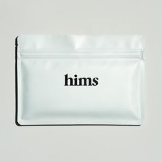 a white bag with the word hims printed on it's front and side