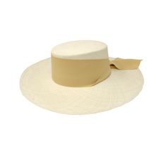 Long Brim Cordovan Hat With Maxi Bow The Panama Hat, also known as Montecristi Hat is a traditional Ecuadorian model made with 100% Toquilla Straw, a natural fiber known for its quality and beauty. The perfect beach-to-city accessory, elegant, yet fresh and versatile for original matches with different kinds of fashion. -We ship with DHL Express. Shipping takes approximately 3 to 5 days to arrive depending on the destination. -Need Help? Please contact: customercare@sensistudio.com -All Sales Ar White Flat Crown Hat Bands For Beach, White Brimmed Boater Hat In Toquilla Straw, White Brimmed Toquilla Straw Boater Hat, White Toquilla Straw Brimmed Boater Hat, White Woven Fedora With Flat Brim, White Flat Crown Straw Hat For Kentucky Derby, White Woven Flat Brim Fedora, Beige Woven Straw Hat With Curved Brim, Beige Woven Brimmed Panama Hat