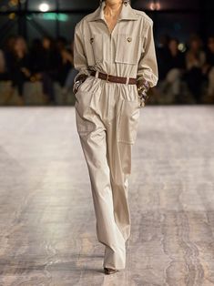 SAINT LAURENT Belted cotton-twill jumpsuit | NET-A-PORTER Utility Fashion Woman, Utility Style Women, Ysl Pants Women, Saint Laurent Women Suit, Saint Laurent Ready To Wear, Chic High-rise Cotton Denim Jumpsuit, Ysl Outfit, Saint Laurent Jumpsuit, Flight Suits