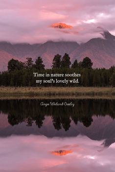 a lake with mountains in the background and a quote about time in nature soothes my soul's lovely wild