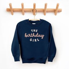 Looking for a cute sweatshirt for your kids? We have the perfect The Birthday Girl graphic sweatshirt addition to their closet! Also available in toddler sweatshirts. Cute Cotton Sweater For Birthday, Cotton Sweatshirt For Birthday In Winter, Cute Crew Neck Sweater For Birthday, Graphic Print Sweatshirt For Birthday In Fall, Cotton Crew Neck Sweater For Birthday, Winter Birthday Tops With Graphic Print, Cotton Sweatshirt For Winter Birthday, Fall Birthday Crew Neck Tops, Winter Birthday Top With Graphic Print