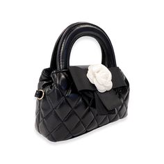 This quilted purse has an eloquent floral applique over a black bow and magnetic clasp. 100% PU leather. Comes with detachable gold chain. Dimension:- 6-3/4" Length x 7" height (included handle)/ 4-1/4" height (excluded handle) x 1-3/4" Width Luxury Black Bags For Spring, Luxury Black Shoulder Bag For Spring, Quilted Rectangular Party Bag, Party Rectangular Quilted Bag, Elegant Quilted Party Bag, Quilted Purse, Quilted Purses, Tie Headband, Coin Bag