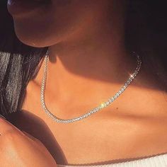 Description: Introducing our exquisite Luxury Cubic Zirconia Crystal Tennis Chain Choker, a must-have accessory that combines opulence with urban flair. Crafted from durable stainless steel, this choker exudes luxury with its sparkling cubic zirconia crystals, meticulously set along the chain. Designed for the modern woman who loves to make a statement, this choker adds a touch of glamour to any ensemble, whether it's for a night out or a casual day on the town. Its sleek and stylish design effo Tennis Chain Necklace, Rock Necklace, Diamond Tennis Necklace, Choker Style Necklace, Tennis Chain, Choker Style, Tennis Necklace, Timeless Accessories, Special Event