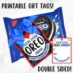 an oreo cookie with a blue bow on it and a printable gift tag