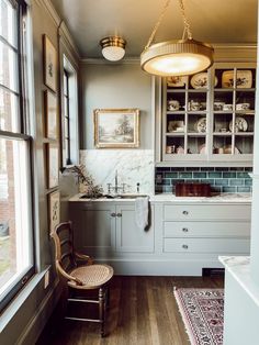 the kitchen is clean and ready to be used for cooking or baking, while also being used as a dining room