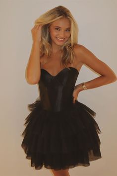 This dress features tulle material, a sleek black color, an A-line silhouette, a sweetheart neckline, a tiered ruffle skirt, an above knee length, and a zip-up back for a comfortable and stylish look. SKU: 3592 Tulle material Black color A-line silouette Sweetheart neck Tiered ruffle skirt Above knee length Zip-up back Highly suggest custom size for plus size. Ship in 7-10 business days. We offer free returns in 7 days. Please refer to our return policy page for more details. If you have any que Cocktail Dress Yellow, Tulle Ruffles, Short Homecoming Dresses, Tulle Material, Satin Homecoming Dress, Tulle Homecoming Dress, Homecoming Dresses Tight, Tiered Ruffle Skirt, Corset Bodice